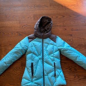Spyder Women’s small turquoise ski jacket.
